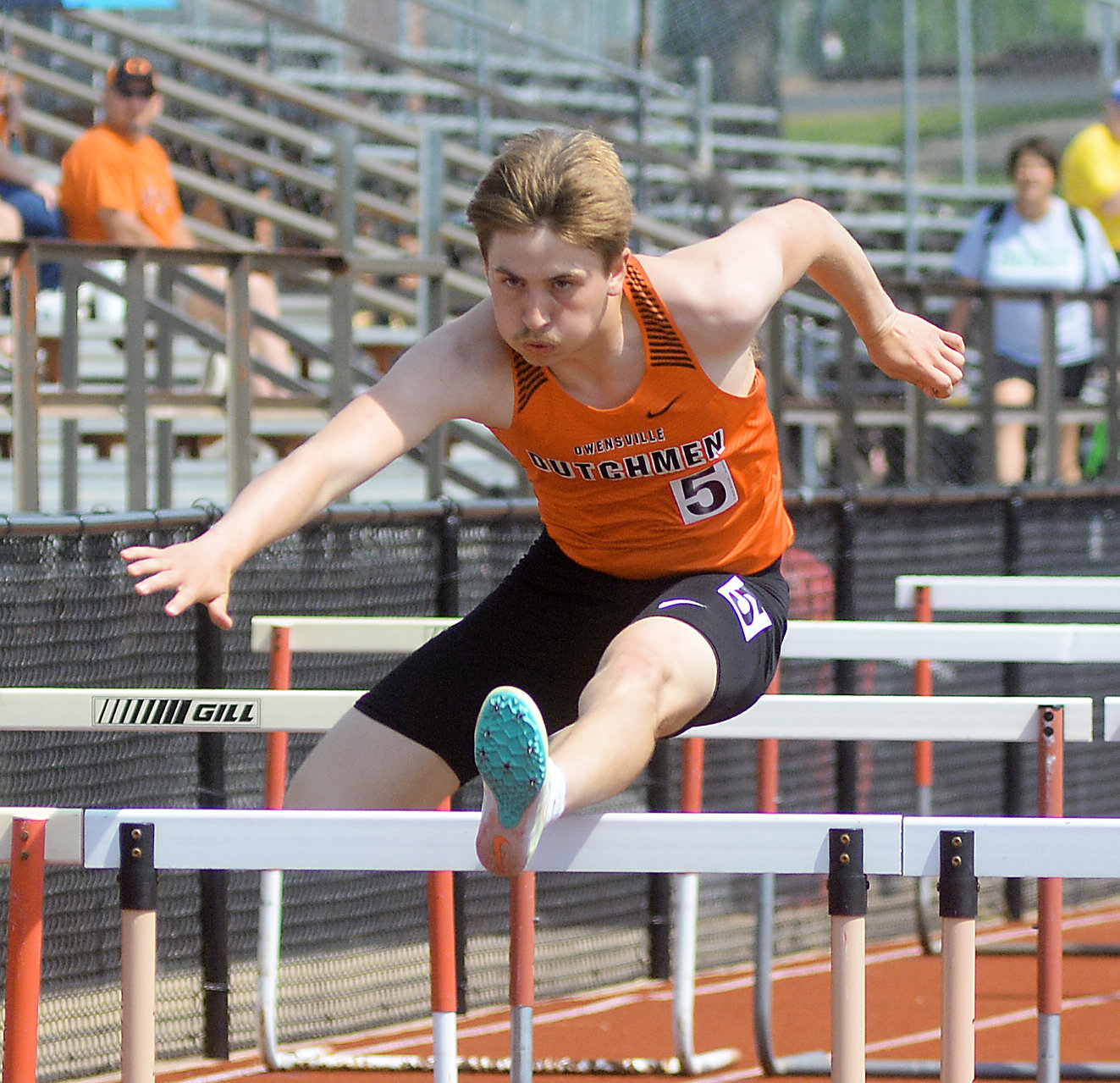 Bryce Payne clears one of several hurdles on his way to second-place finishes in both the 110-meter and 300-meter hurdle races.